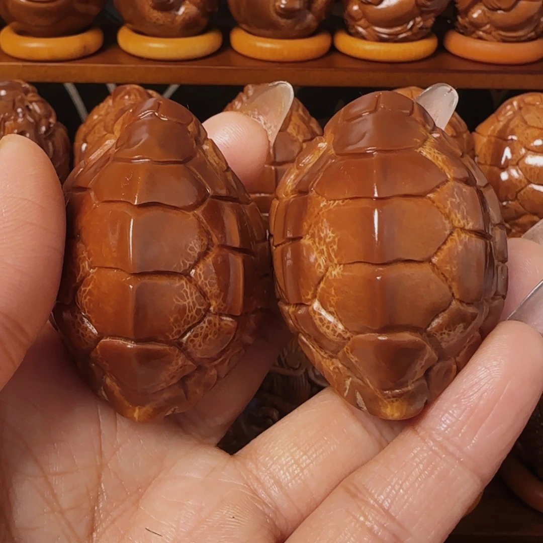 橄榄核把件用****9富甲一方手把件39