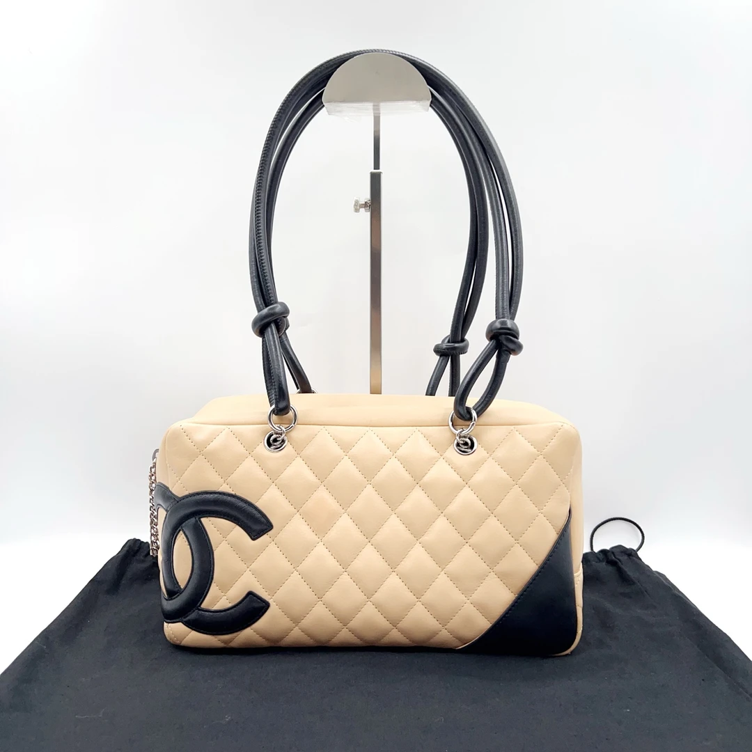 95新 Chanel/香奈儿 中古奶茶色康鹏枕头包 0464