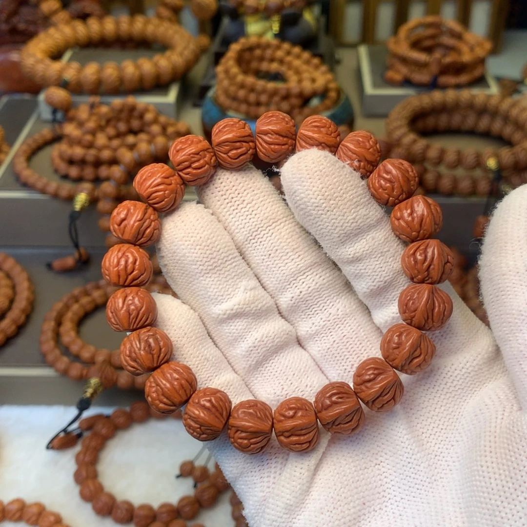 伴****桃核手串秦岭龙纹