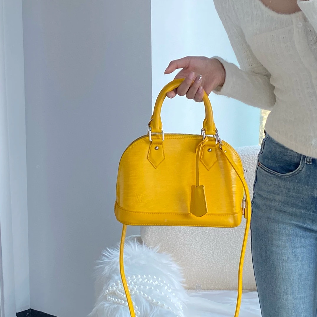 95新 LouisVuitton/路易威登 lv太阳黄bb贝壳手提斜挎包