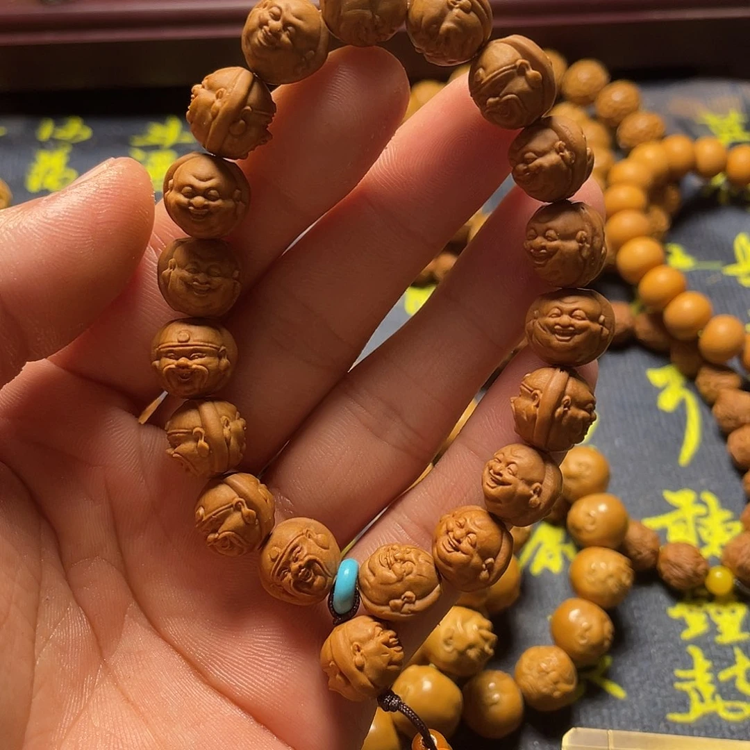 啊*哥龙纹桃核雕刻财迷