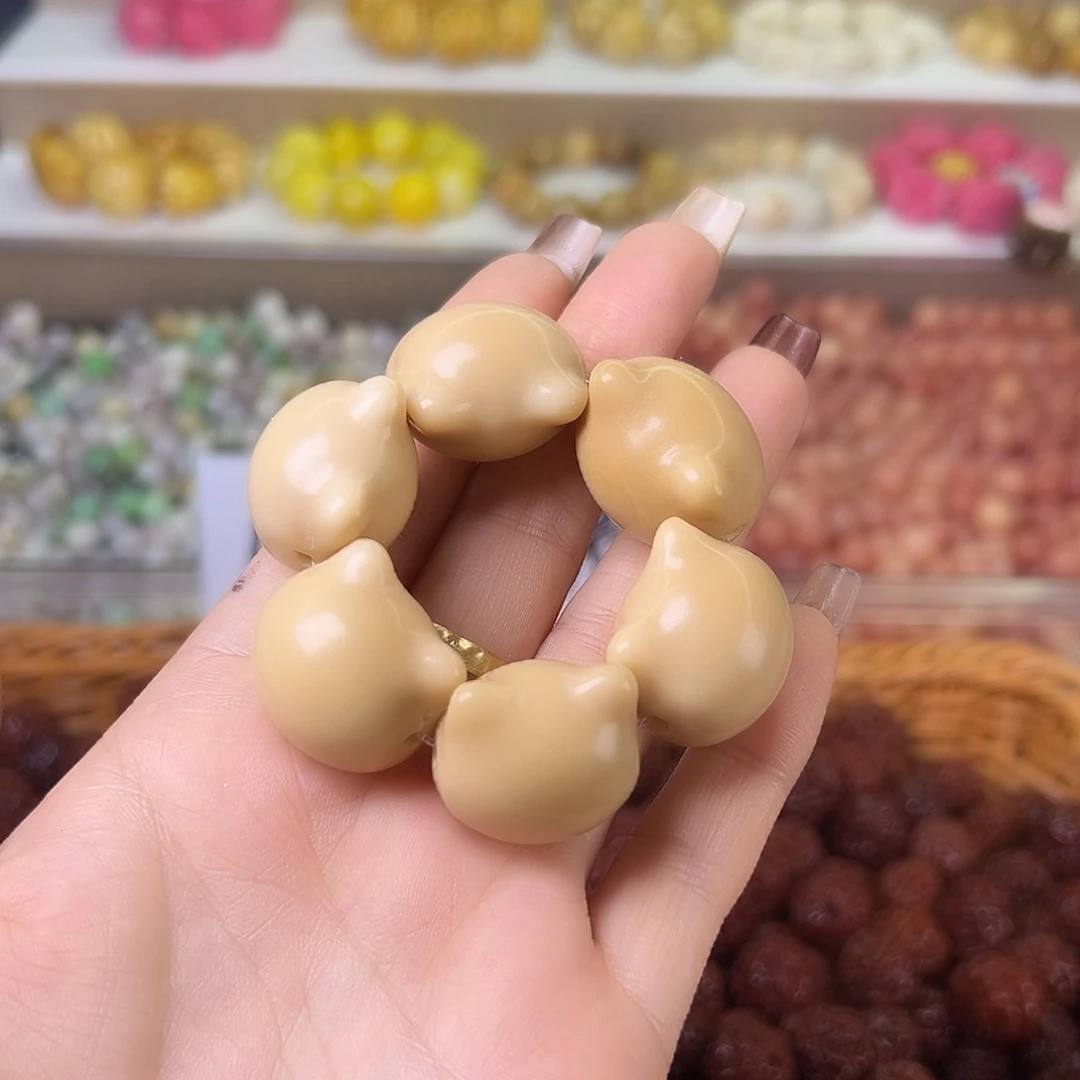 菩提根/象牙果吊坠微瑕茶色猫手捻1条有裂