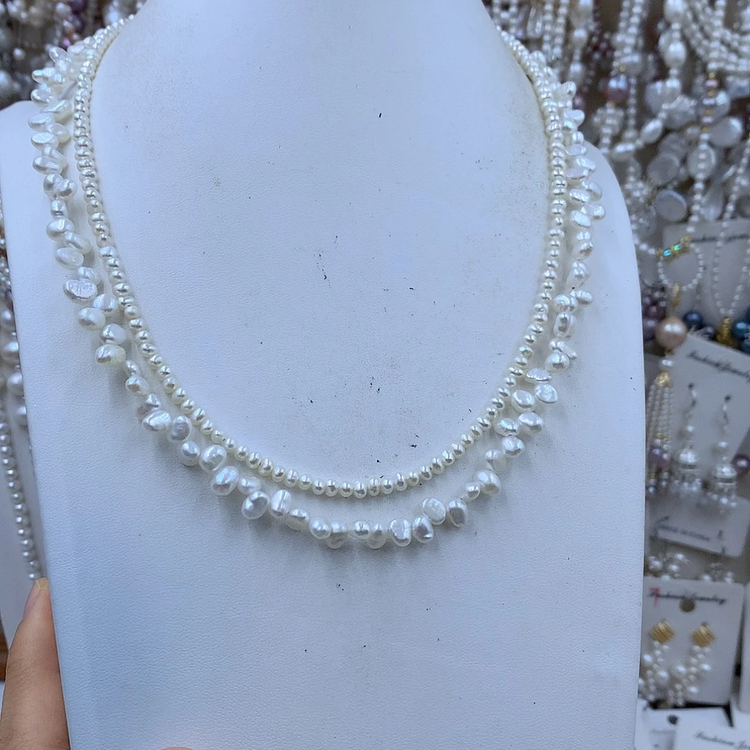 颈饰合金淡水珍珠落**痕