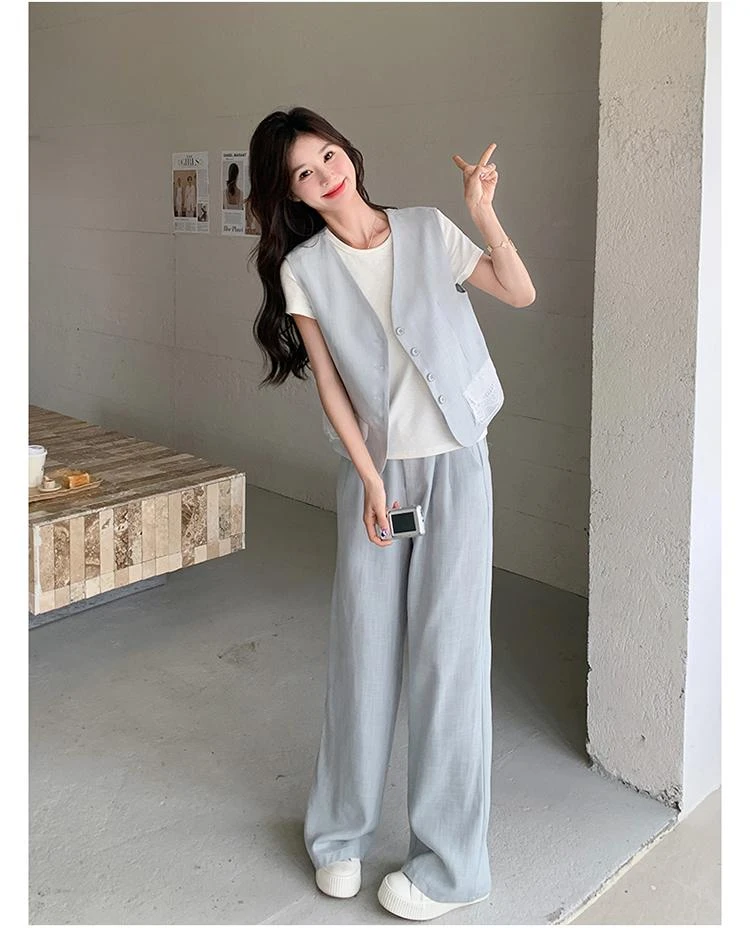 蓝色休闲蕾丝拼接小西装马甲套装女春新款显瘦时尚垂感长裤三件套