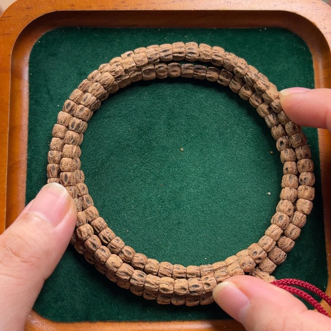 罩***满手串柏香籽/百香籽