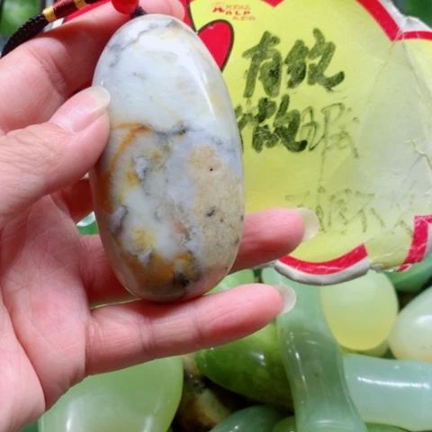 未镶嵌蛇纹石玉手把件