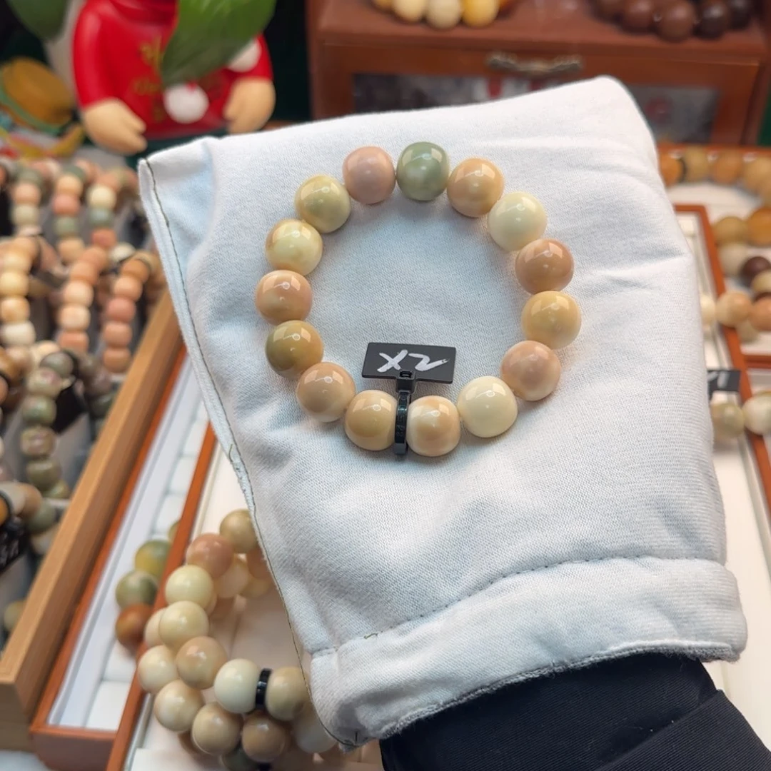 菩提根/象牙果手串铛****?卡16瑕疵2