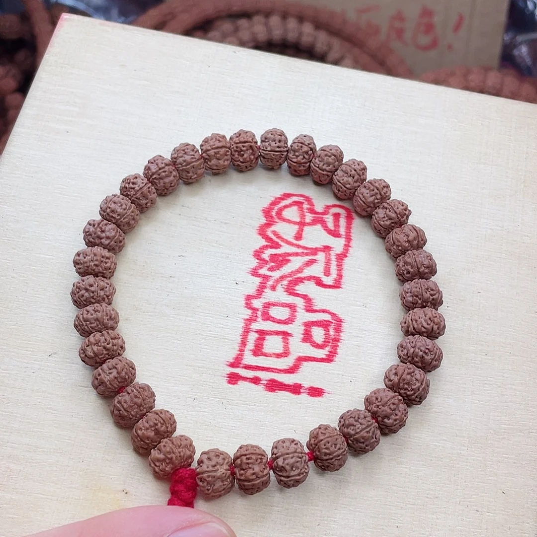 金刚菩提手串见*哥王者梅花六瓣，纯天然原皮