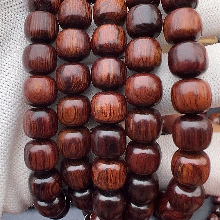 秦***钟木木本海南红降花梨公1.0黄油底满妖孽纹