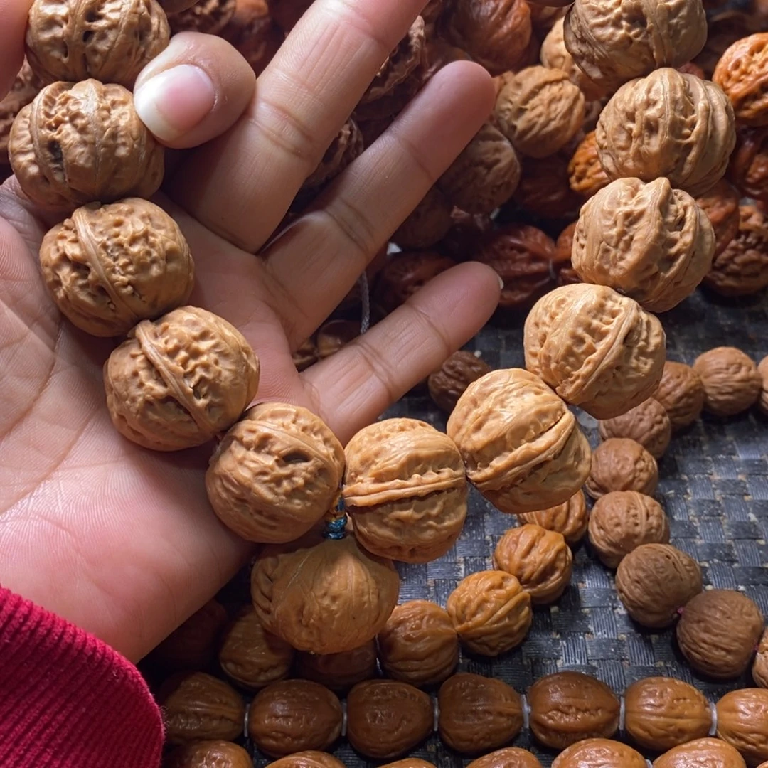 x***e文玩核桃吊坠磨盘