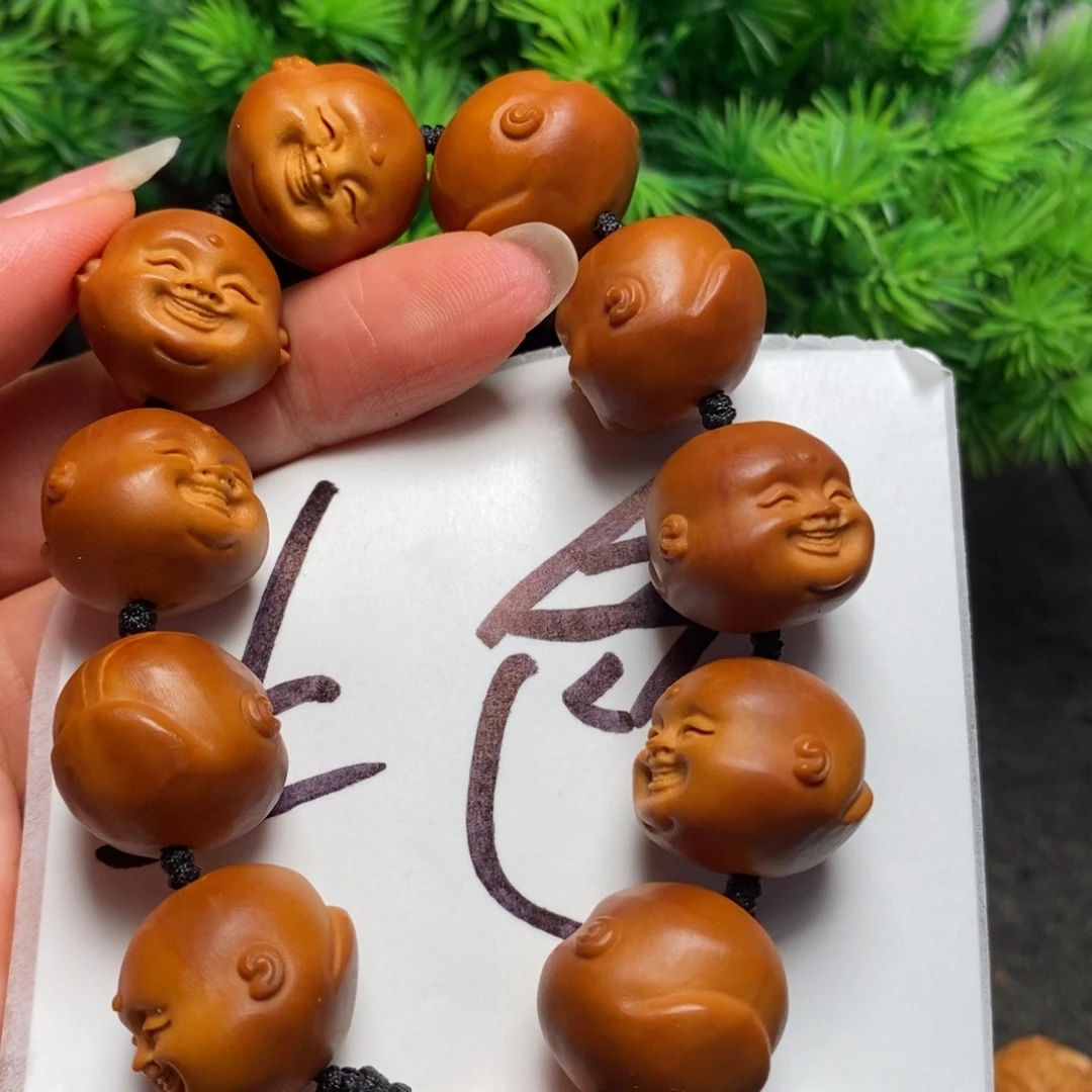 鲤***生橄榄核手串/手链十分开心微花
