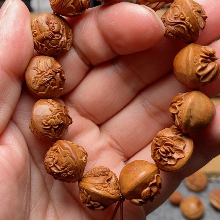 骏桃核手工雕刻观音手串