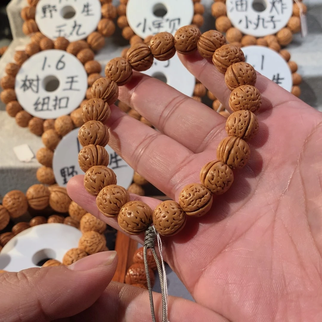 桃核手串豌****了野生14桃核无修无抛手持
