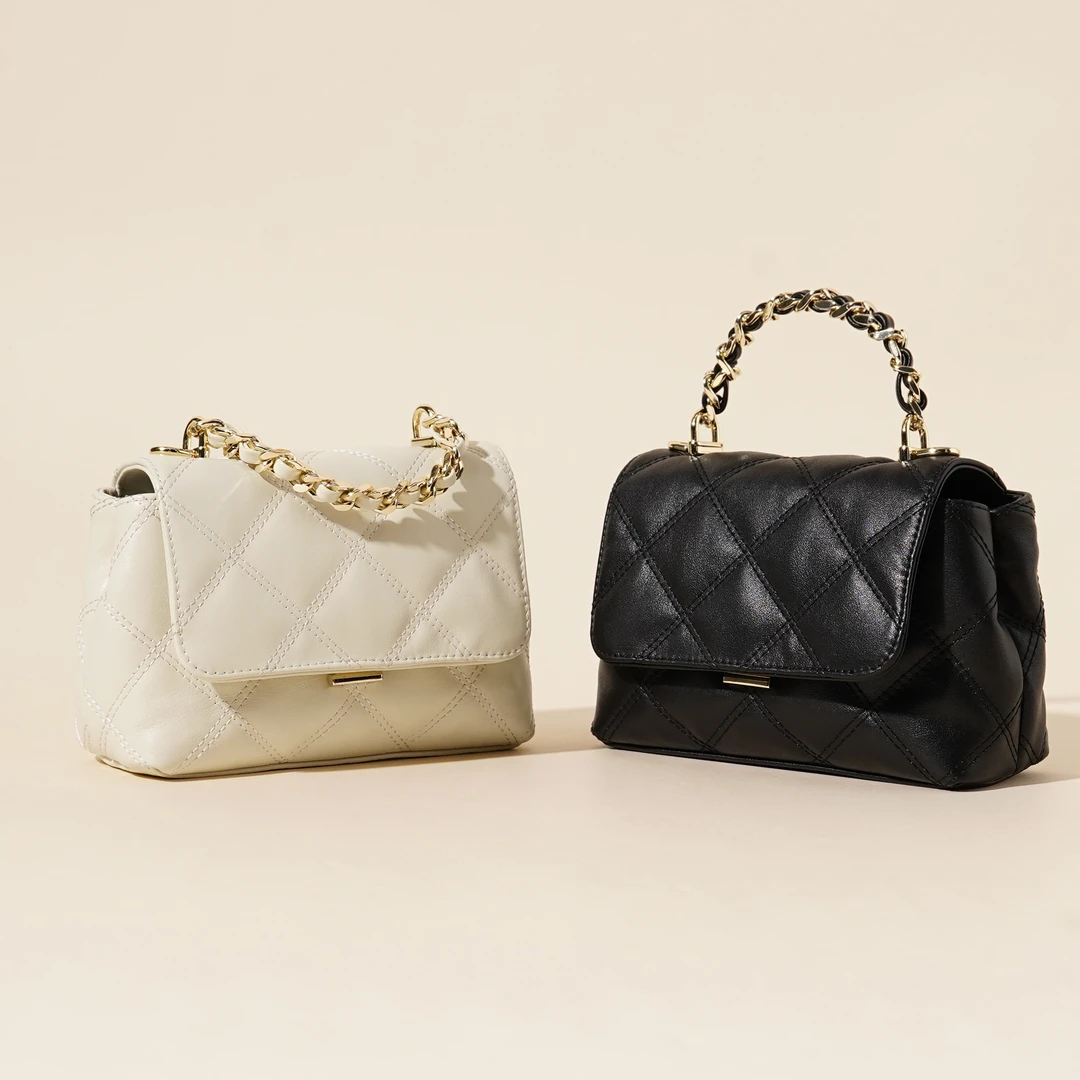 岩牛2025国庆新款轻奢风时尚潮流斜挎包女士欧若精灵风YN3630