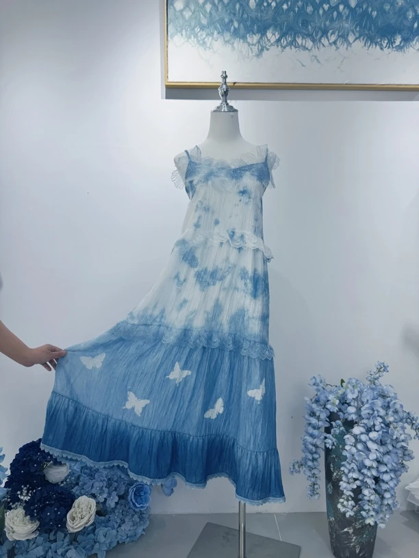 手工植物扎染新款飘逸渐变印花吊带裙女夏季清新设计感显瘦长裙