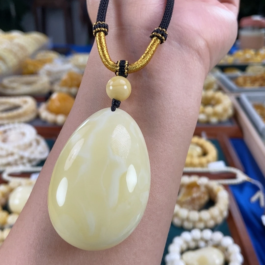 琥珀未镶嵌珠宝奇石24.52白花蜡水滴吊坠