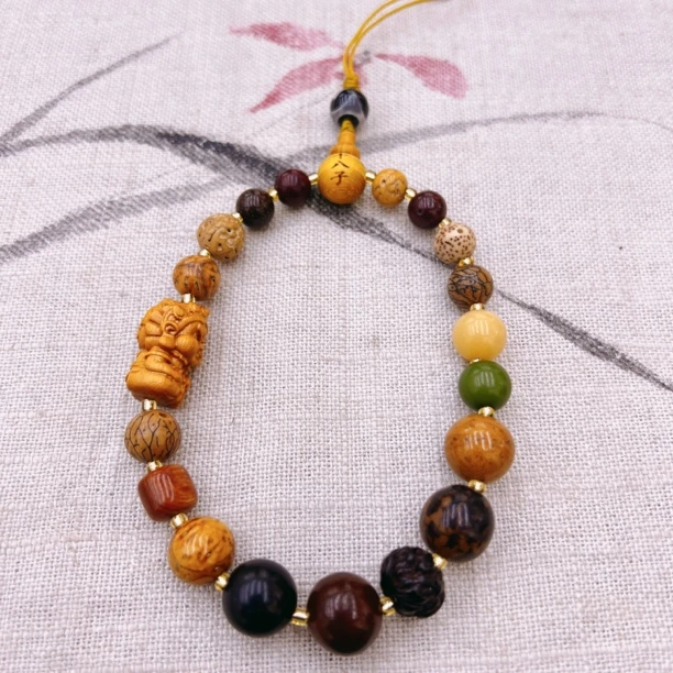 天然木串十八籽手机挂