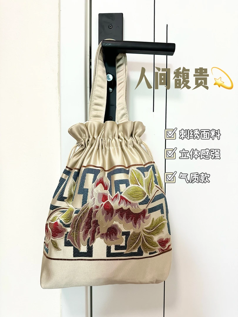 文艺小众手提包带印花刺绣中国风手拿包耐磨民族风休闲复古抽绳