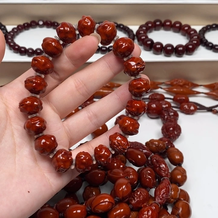 下***。橄榄核雕刻工艺的发展