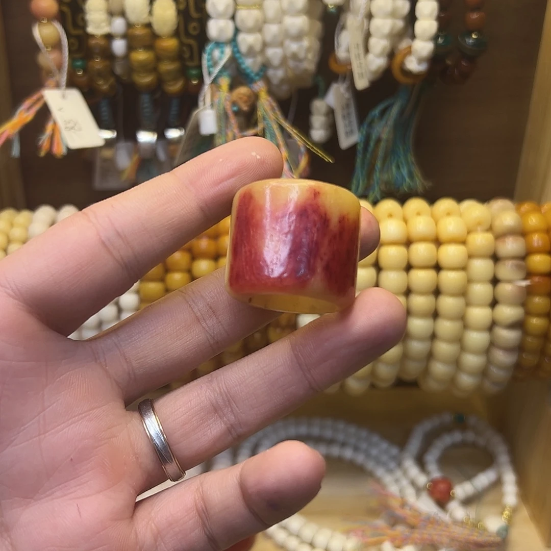 懋***默吊坠桃核驼骨扳指