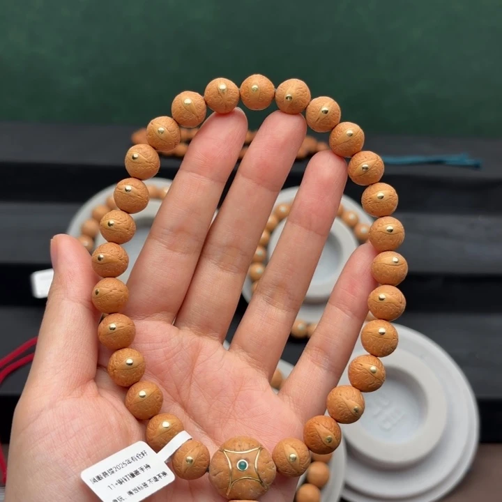 O***h手串凤眼菩提11+铜钉镶嵌手持
