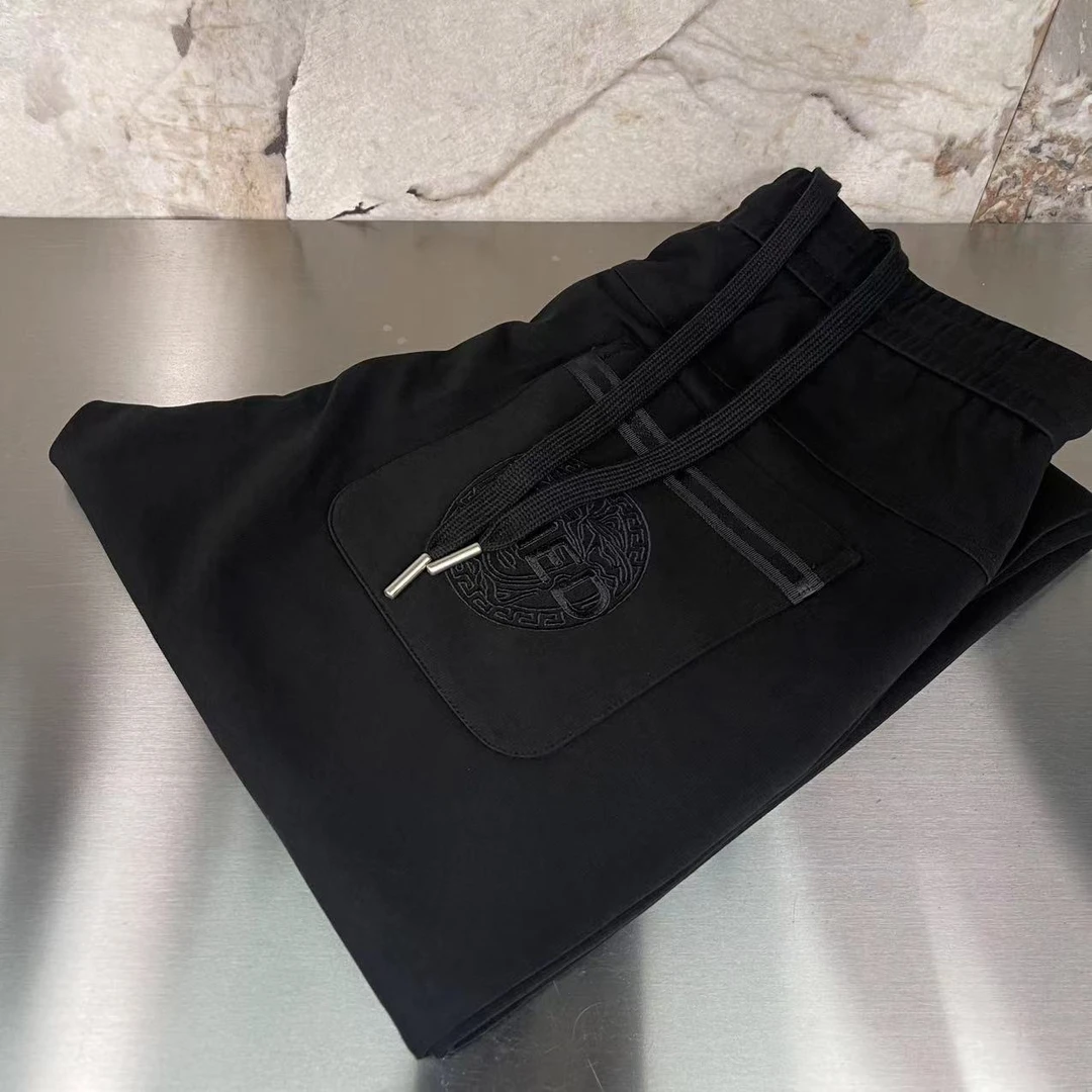 518夏季新款男士时尚百搭设计师款美人头束脚休闲裤