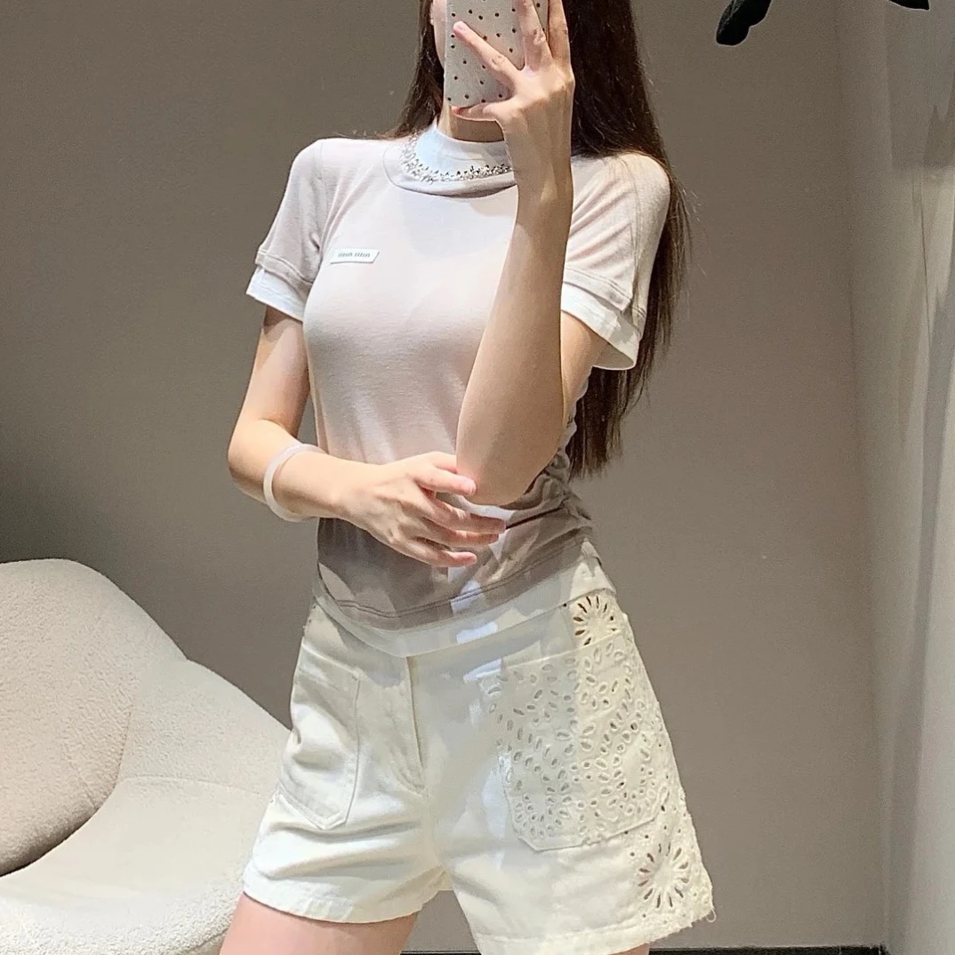 99新 DIOR/迪奥 D500968/镂空设计白色短裤/34码