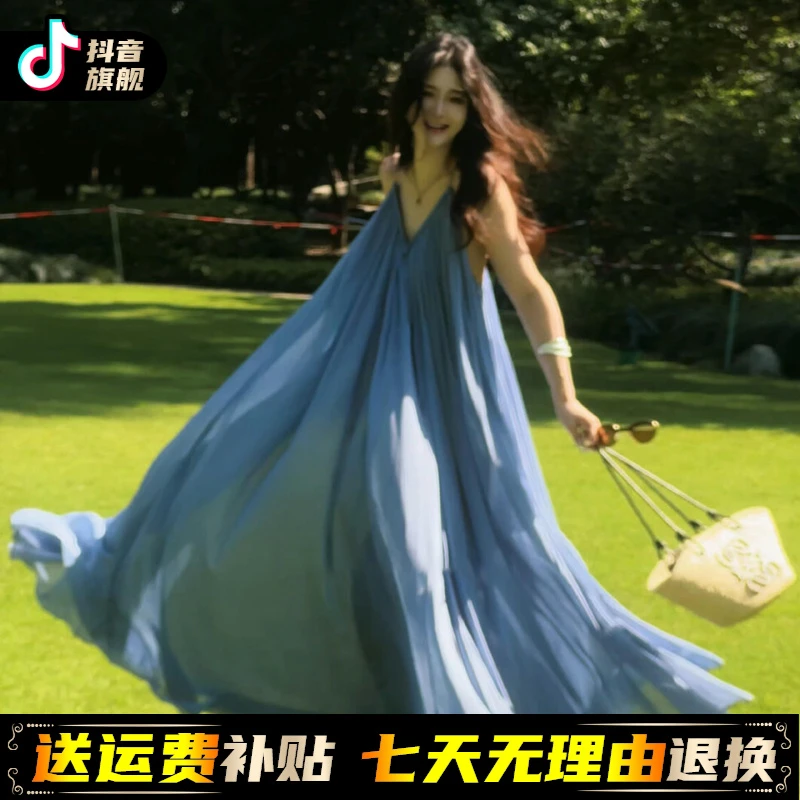 法式海边度假蓝色吊带连衣裙子女夏季新款气质无袖露背沙滩长裙子