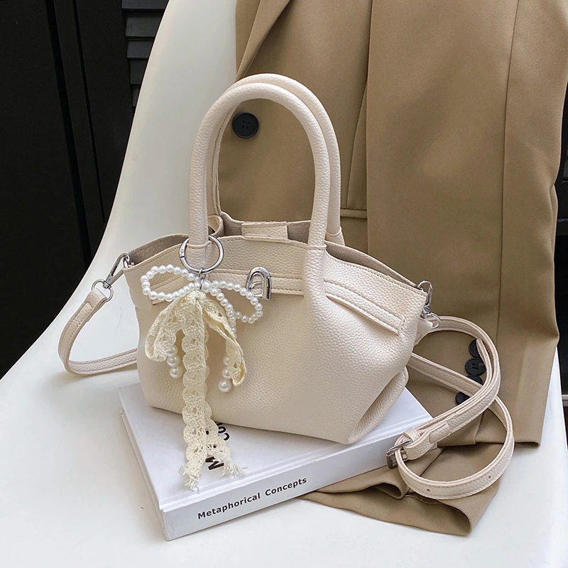 新款软面防盗单肩款饺子女包单肩斜挎包卡位拉链简约风方形手提包