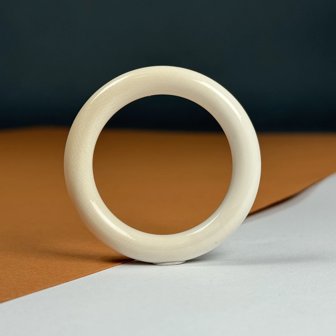 E12-90天然猛犸牙 手扣35.5*50*8mm 支持鉴定 假一罚四