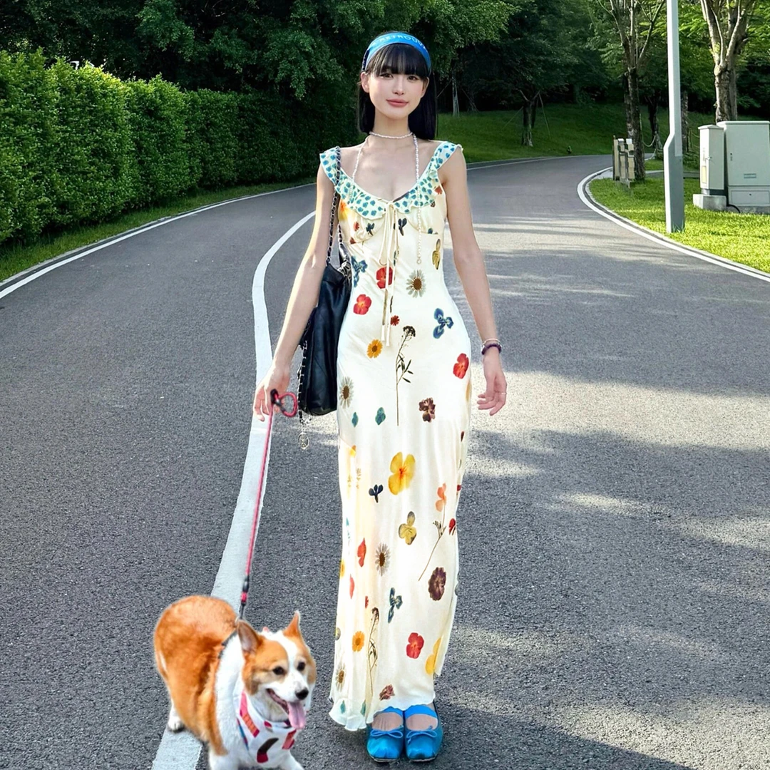 旅游度假风碎花吊带连衣裙子女夏2025新爆款今年流行海边绝美长裙