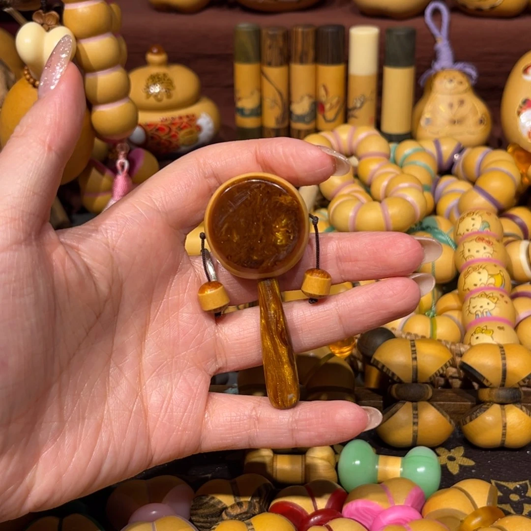 骨料镶口拨浪鼓。