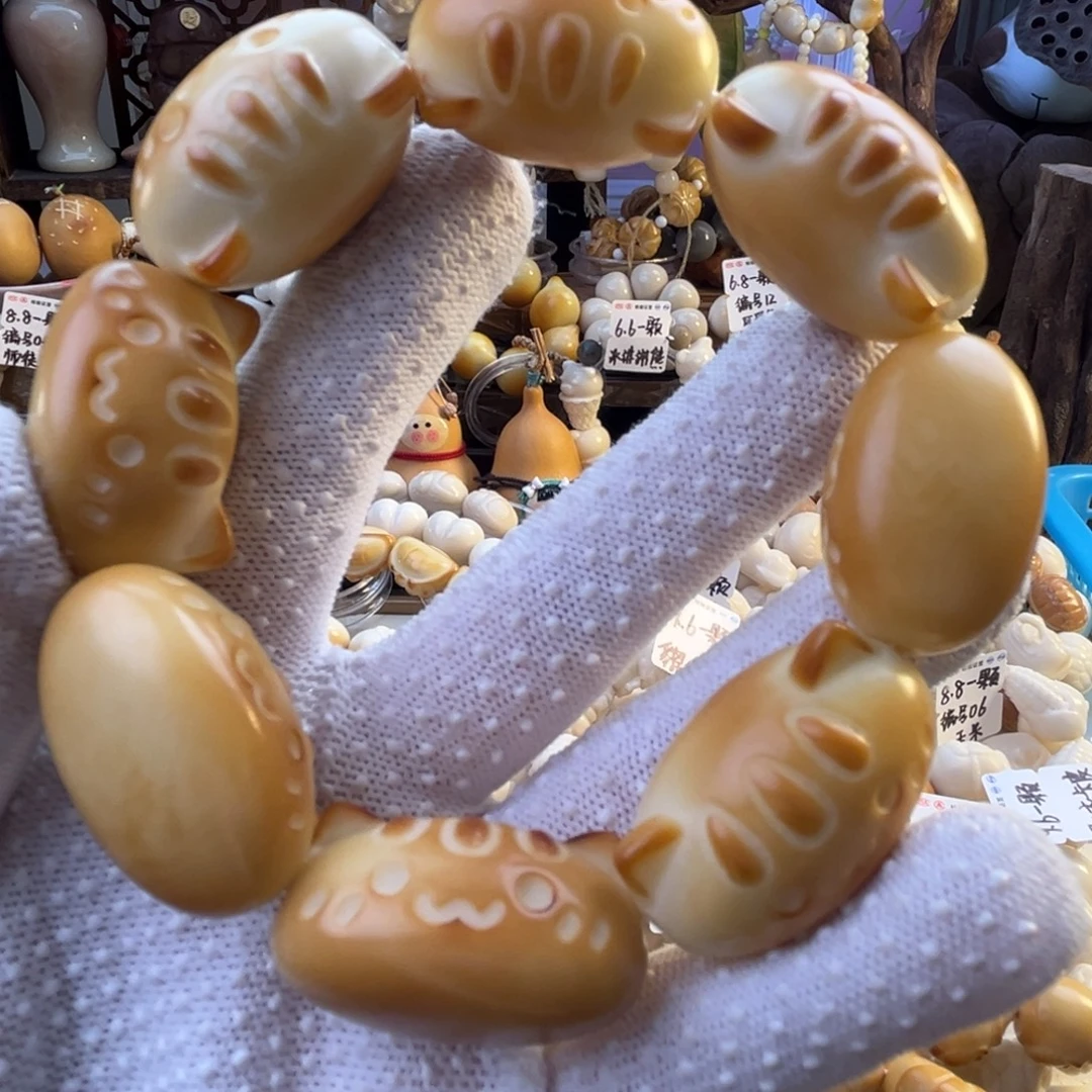 菩提根/象牙果手串-烤色法棍猫