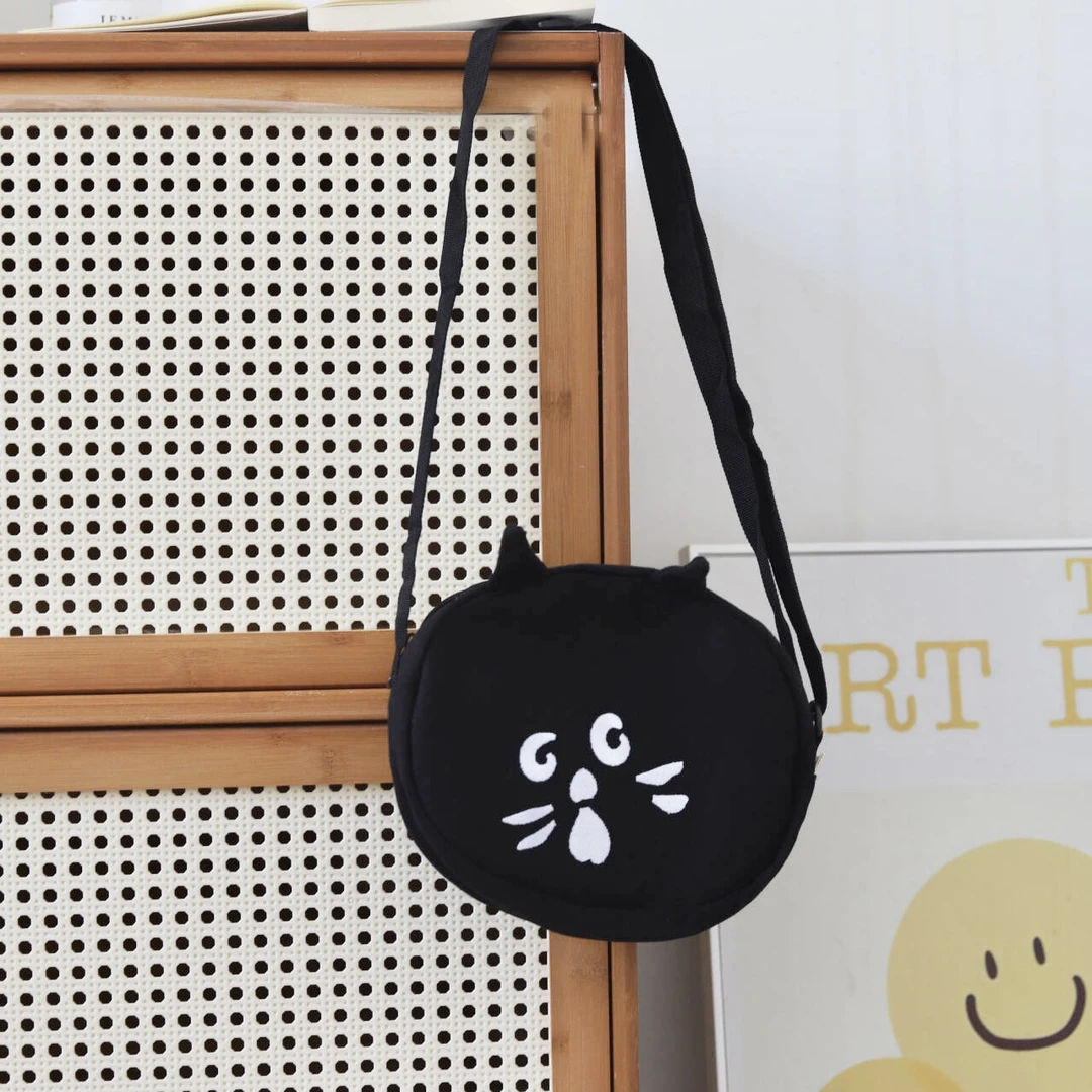 日系网红惊讶猫休闲时尚少女斜挎包包简约刺绣都市简约防水包包