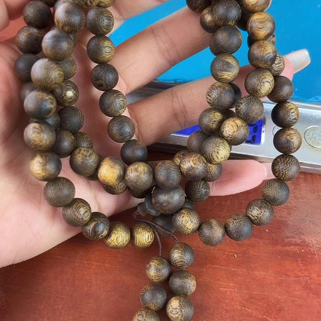 輝****沉香碎屑沉香卡9圆珠多圈39g