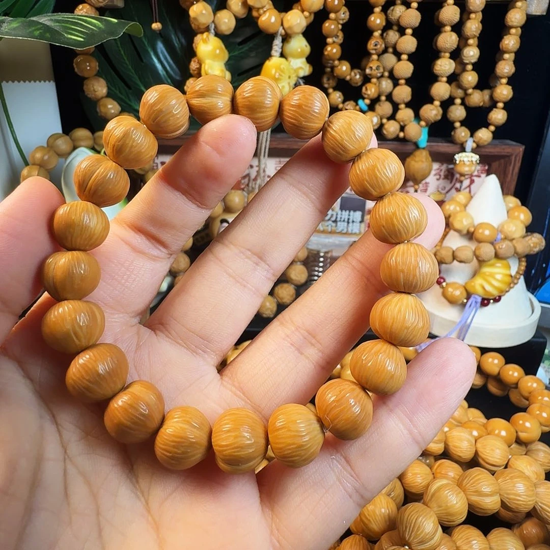 猴头核桃手串西***奶拉丝屁桃