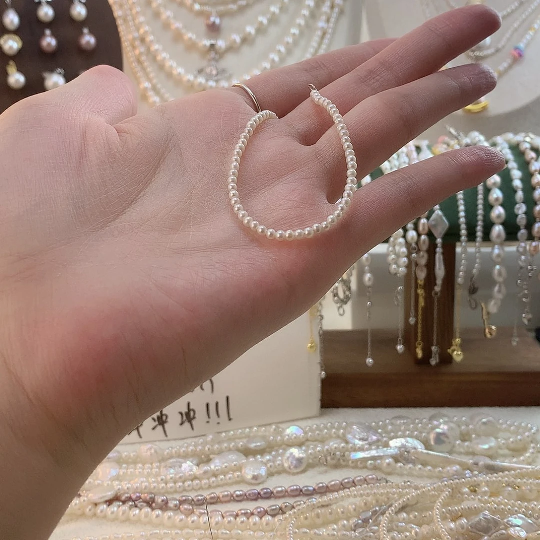 咿***呀银S925镶嵌手绳淡水珍珠