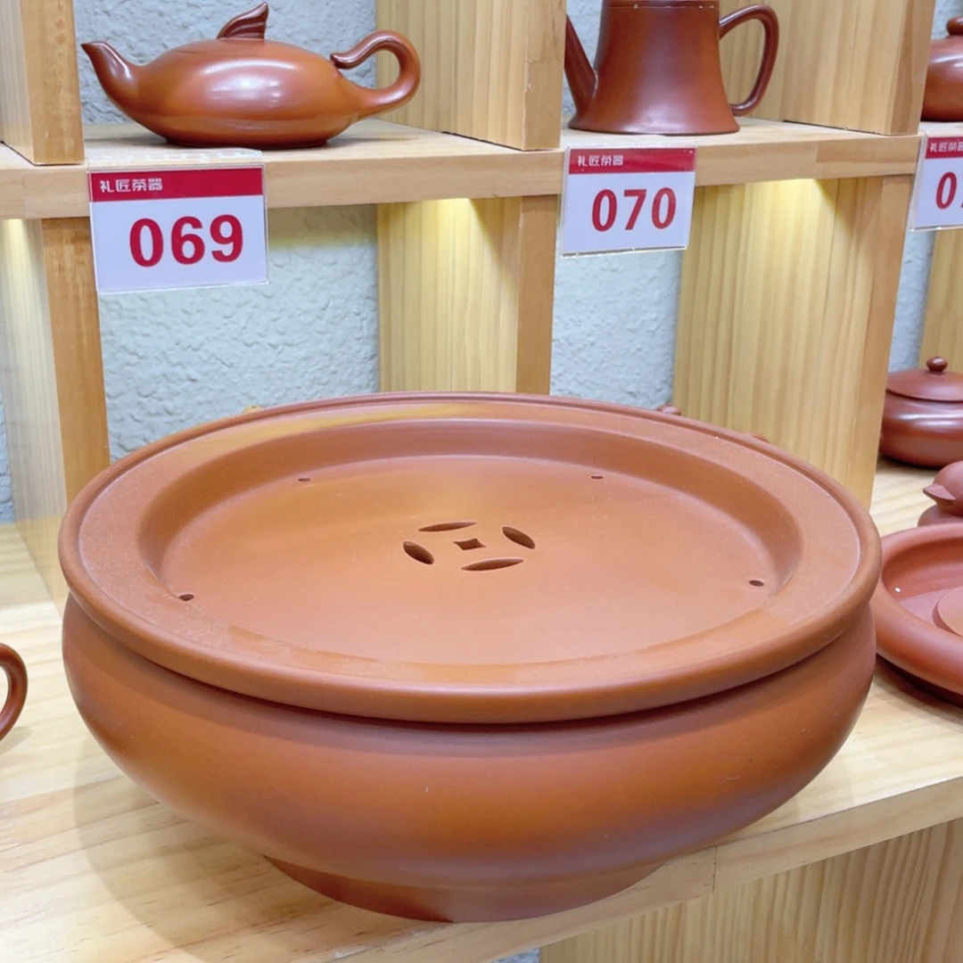 茶壶紫砂渔**。十寸高身铜钱