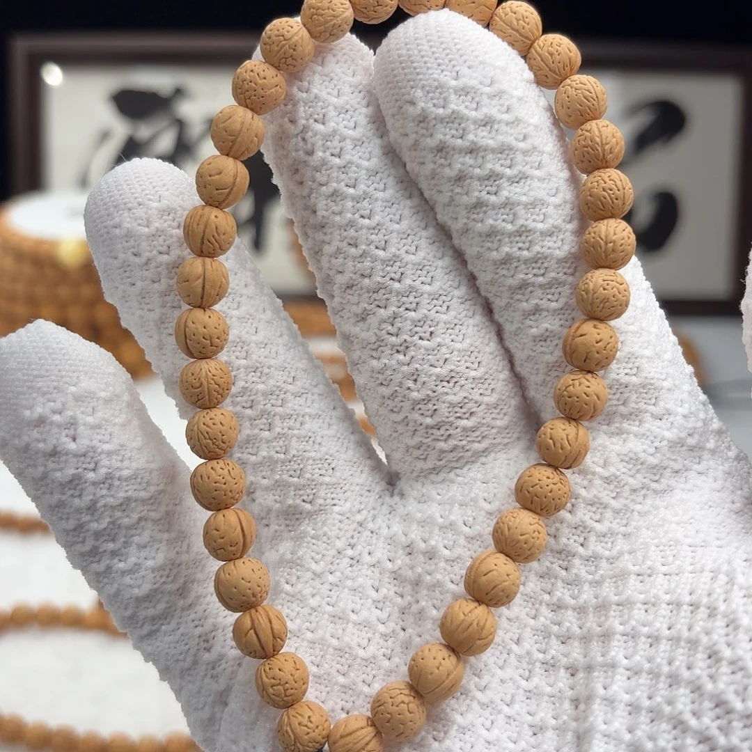 桃核手串0.7加「骄阳」野生桃核手持