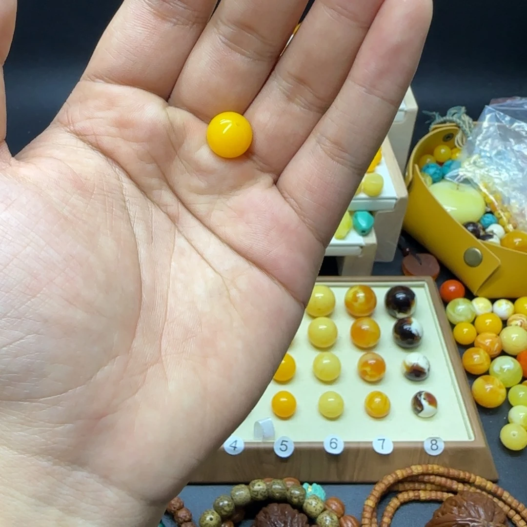 乐***颜琥珀未镶嵌裸石..