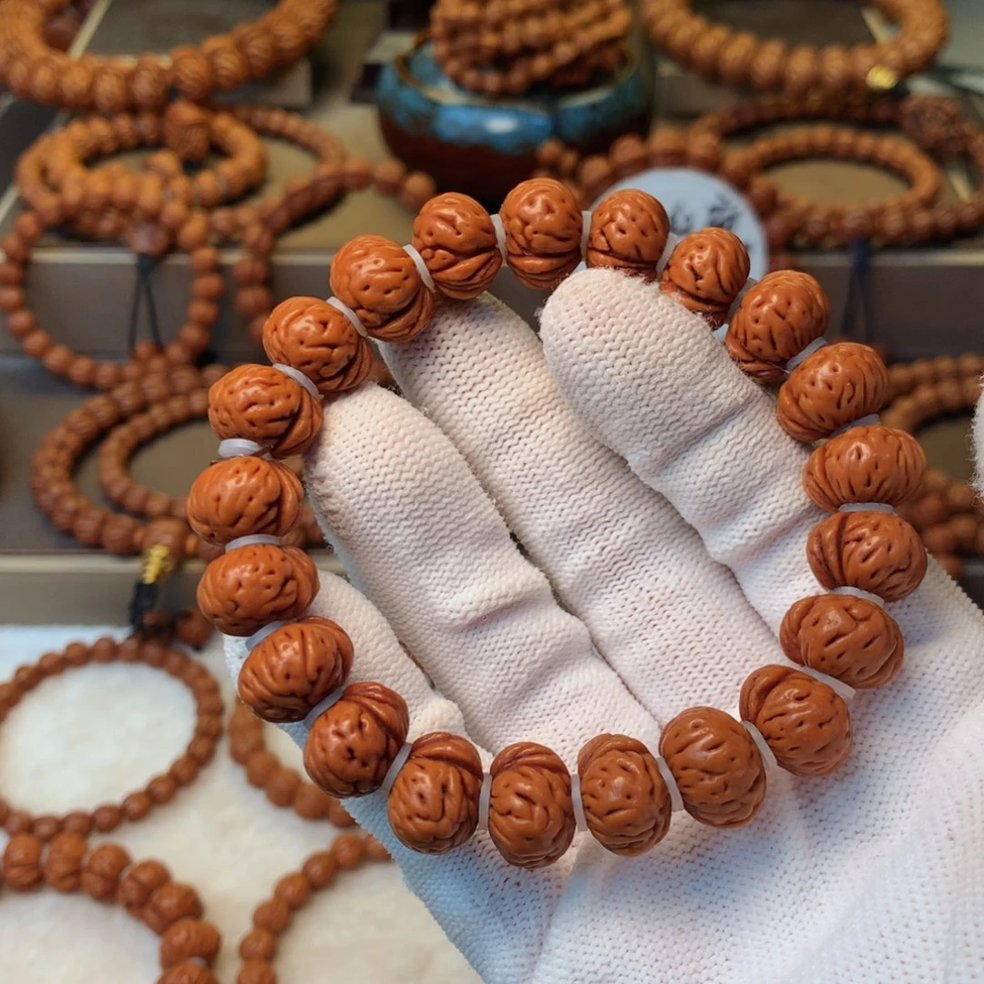 “***玩手串桃核秦岭龙纹