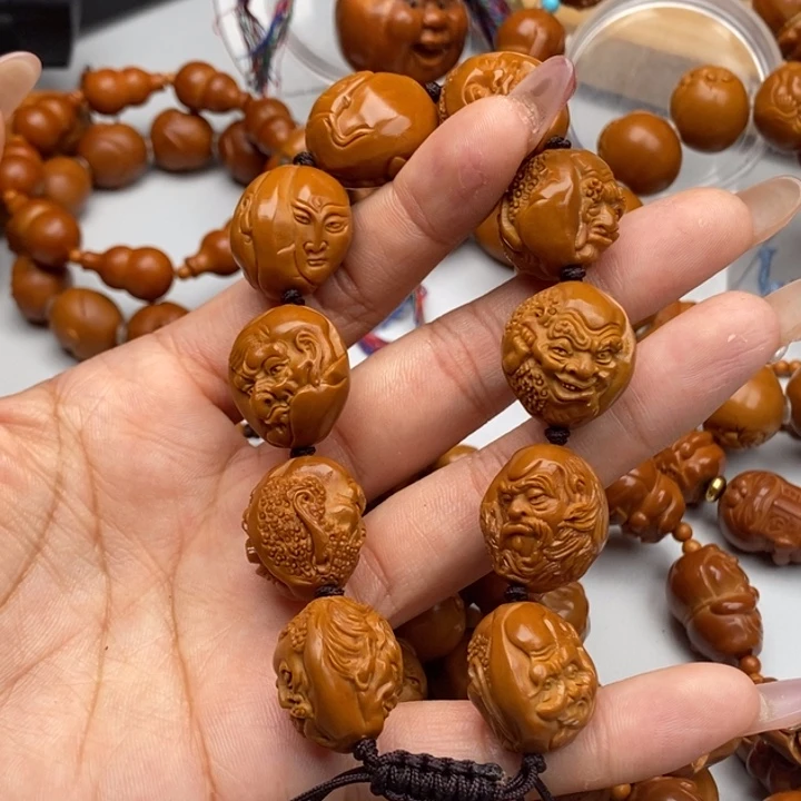 白***铺橄榄核吊坠罗汉三藏