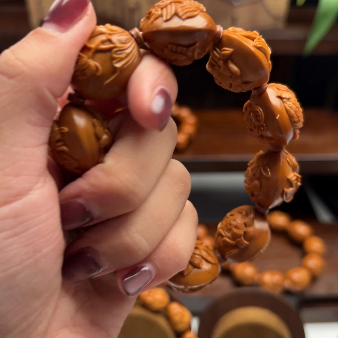 #***子橄榄核手串/手链荷花鱼