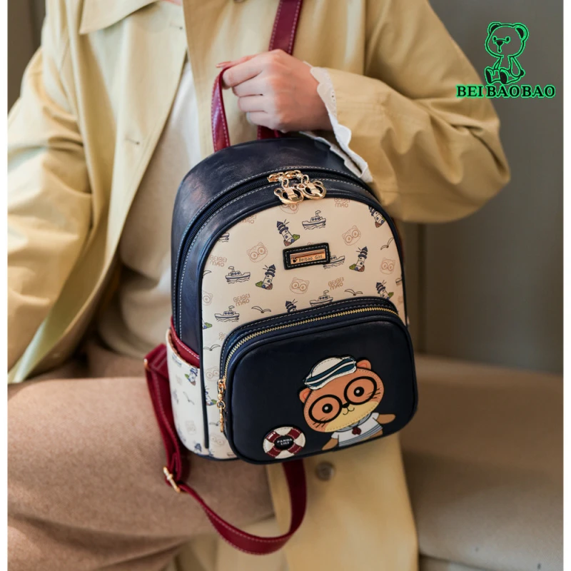 北包包新款休闲韩版时尚百搭猫咪背包潮流日韩可爱卡通设计双肩包
