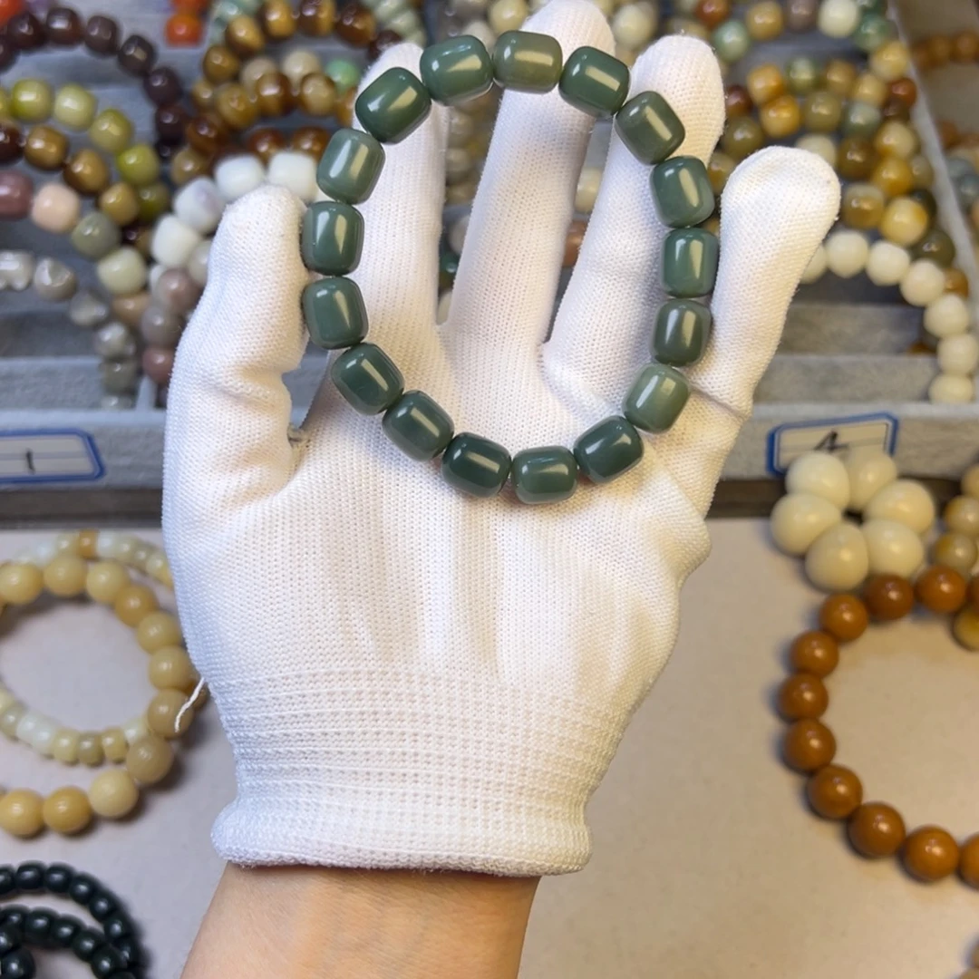 吊坠菩提根/象牙果阴皮绿小年糕10×12一颗瑕