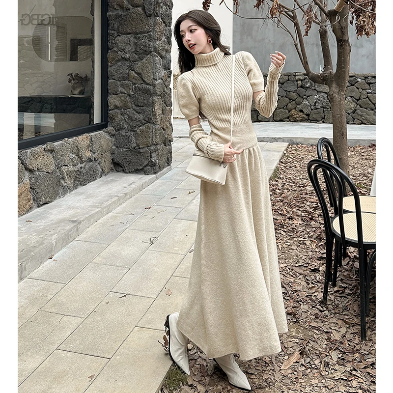法式显瘦慵懒风别致独特修身袖套针织毛衣套装高腰半裙两件套女冬