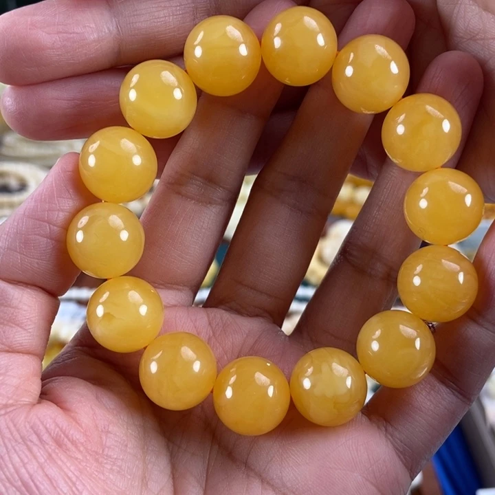 琥珀未镶嵌珠宝奇石15鸡油红圆珠27.88