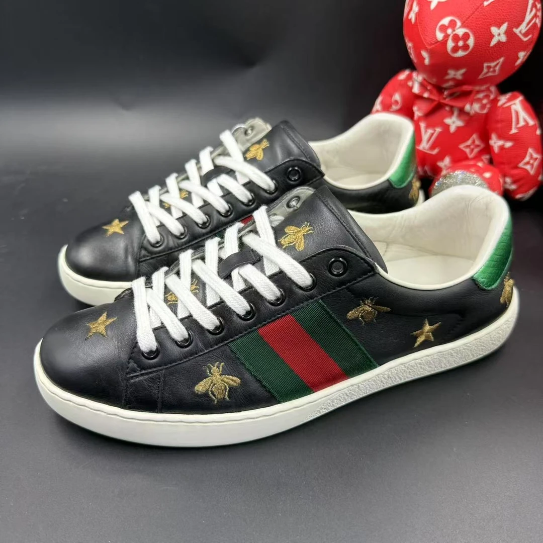 95新 GUCCI/古驰 男士黑色金星蜜蜂刺绣板鞋41.5欧码 ddm2697