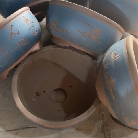 紫砂花盆100-7。    22.5-10.5