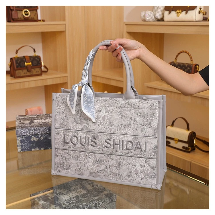 刺绣帆布包包女2025新款爆款时尚托特包外出旅行上班手提购物袋女